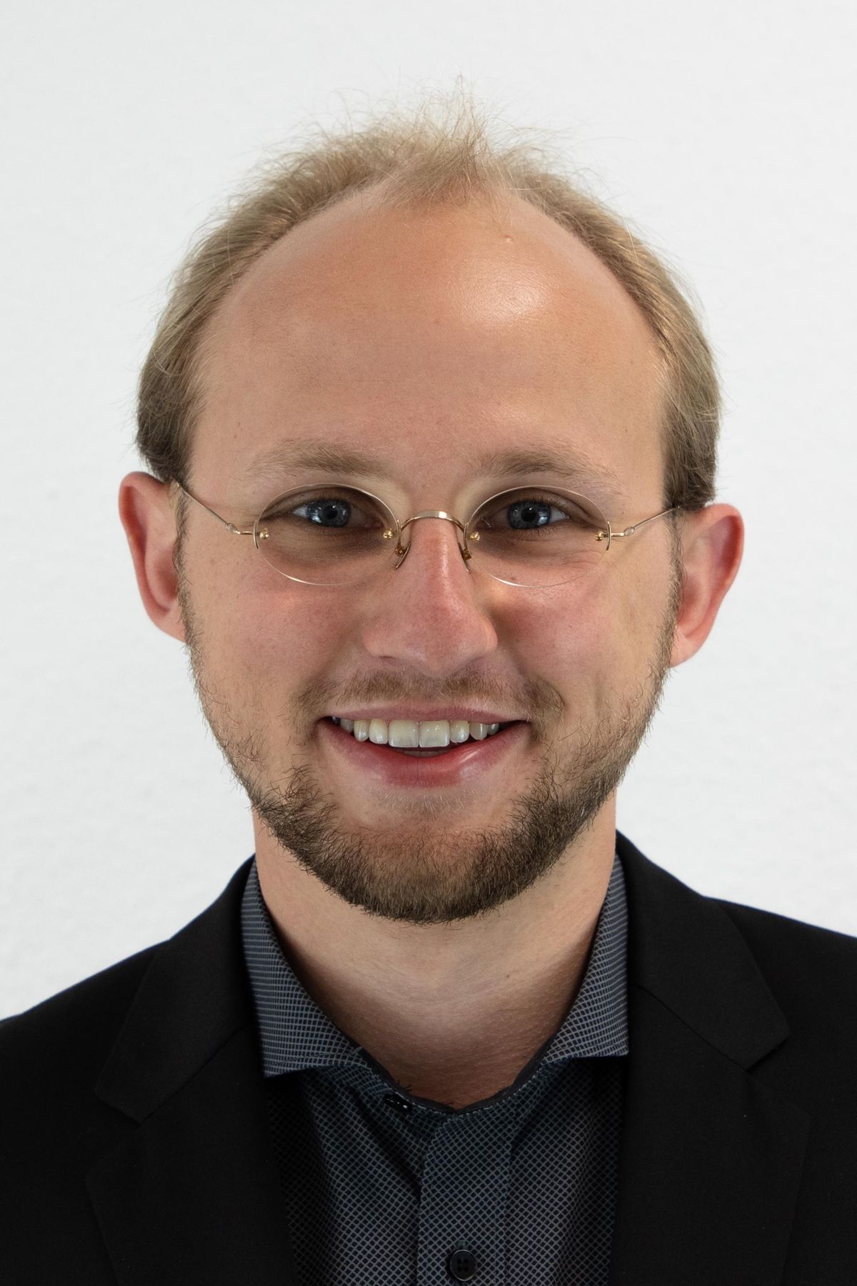 Nikolas B. Schrader